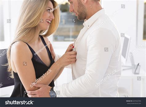 Woman undressing a man. Things To Know About Woman undressing a man. 