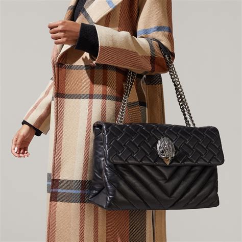 Discover the latest range of women's cross body bags from Kurt Geiger London. Discover our newest collection of black, leather and embellished camera bags and cross body styles. October ... Product: Kensington Camera Bag, Brand: Kurt Geiger London, Colour: black, Price: $185.00 Line Number: 5294400109. Kurt Geiger London. Kensington Camera Bag. 