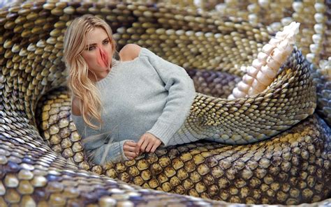 Women buts snake in pussy. .  ...