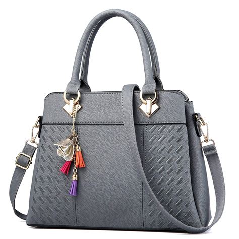 Women purse brands. Feb 7, 2023 · Backed with 8,750+ positive reviews on Amazon, the Ynique Satchel Purse and Handbag Combo for Women is an all-time bestseller. Both the bags are very well made and look extremely classic on almost ... 