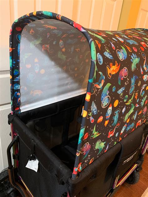 Wonderfold canopy pattern. MADE SPECIFICALLY FOR WONDERFOLD W4 Elite/Luxe – This cover was specifically designed for the WONDERFOLD W4 Elite/Luxe Quad Stroller Wagon HOOK AND LOOP CLOSURE WINDOW OPENINGS – Easy accessibility makes getting kids in and out of the wagon simple with the stylish stroller weather shield installed 