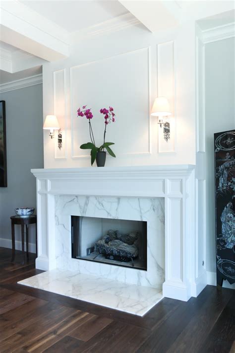 Wood and Marble Fireplace with Gilded, Infinity Design Accents