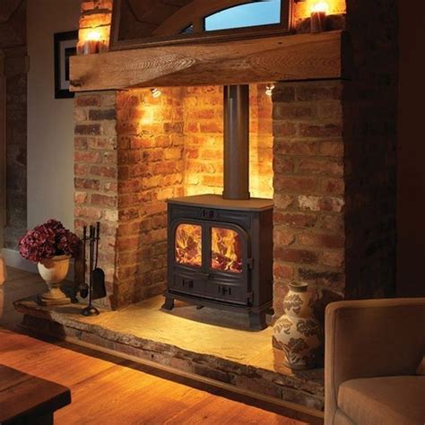 Wood burner and fireplace. 30 Mar 2021 ... If you enjoy the aesthetic of a traditional fireplace, you also have the option to instal a more modern wood stove design within your home. This ... 