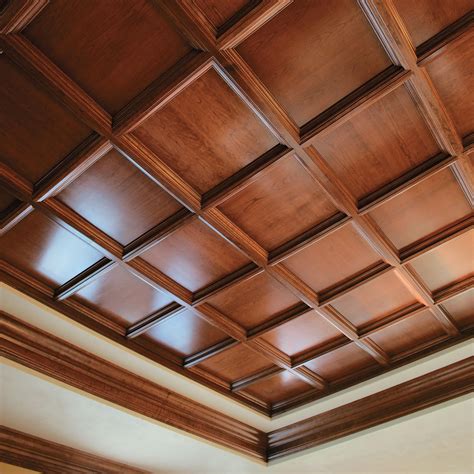Wood drop ceiling. Suspended ceilings, sometimes called drop ceilings, are secondary ceilings hung below the central ceiling of a room. They are typically constructed using a grid of metal channels or wires supporting ceiling tiles or panels. These tiles can be made from various materials, including mineral fiber, fiberglass, or metal. 