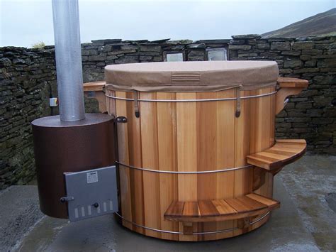 Wood fired hot tub. Dimensions: 84 inches in diameter, 38 inches deep. Weight: 300 lbs empty / 7000 lbs filled. What's Included. AlumiTubs are a complete wood fired hot tub kit with everything needed for function and performance, including free shipping anywhere in Canada and $500 across the United States. Wood burning hot tub. 