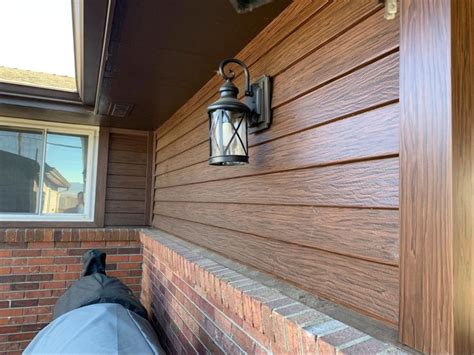 Wood look siding. A clapboard house is covered in wooden horizontal siding, called clapboards. The wood siding is thick on one edge and narrow on the other. Clapboard was the predominant type of sid... 