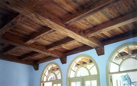 Wood paneling ceiling. Keep the ceiling and walls wood panels a lighter shade, while the flooring can be dark, stained wood. Conceal only lower half of the walls with wood panelling. … 