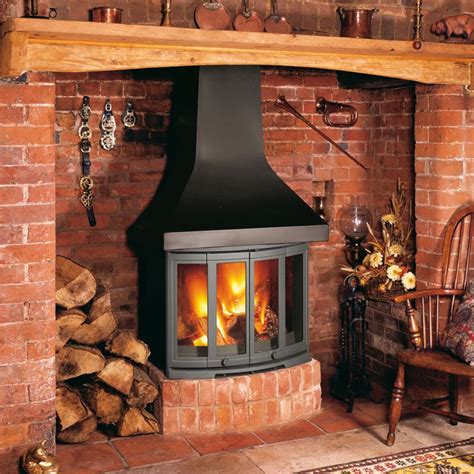 Wood stove in fireplace. 3. Fireplace Inserts. A fireplace insert, also known as a retrofit, functions similarly to a wood-burning stove, but you insert it into the firebox of an existing fireplace. These sealed, prefabricated inserts produce fewer pollutants compared to traditional fireplaces. 
