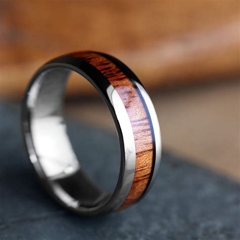 Wood wedding bands. Product type. Couple & Wedding Ring Sets 75. Pair of Blue Fire Opal & Meteorite [6 & 8mm] Black Titanium Ring Set SKU: RS0077. $355.00. Pair of Titanium Rings [4&6mm widths] Meteorite SKU: RS0075. $310.00. Pair of Gun Grey Tungsten Carbide Ring [5&8mm width] 18K Gold Flake, Meteorite, & Hawaiian Koa Wood SKU: RS0076. $355.00. 