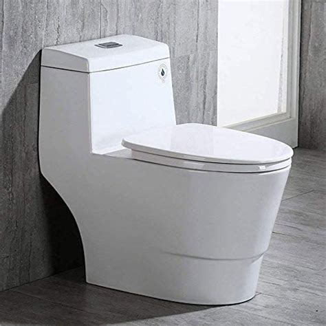 Woodbridge cotton white t-0019 toilet. Woodbridge Cotton White T-0019 toilet features a dual flush system for saving water and energy. The 1.6 GPF (gallons per flush) wash and 0.9 GPF offers plenty of water when you need it, while saving water at the same time. With an elongated bowl, the Cotton White toilet uses less floor space allowing more room in your bathroom. 