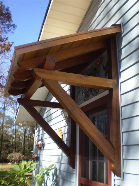 This is a tutorial on how to build a door canopy. This door canopy is made out of wood which includes 2-2x4s for the horizontal arms, 2-1x4s for the vertical arms, 1-1x6 for the top, and 1-1x2 pine pieces (which you can substitute with pine board) for the trim strip. This door canopy is easy to make but requires some basic woodworking skills..