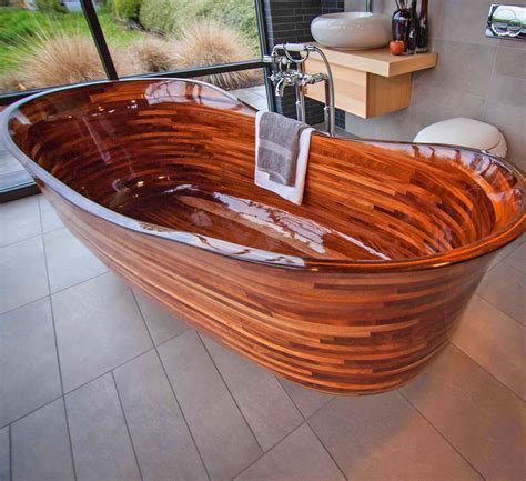 Wooden tub. 61" Freestanding Cedar Wood Slipper Tub w/Faucet. Model #: ALF-61CEDAR-AB1139. This 61 inch freestanding wooden bathtub features the beautiful slipper tub design with an attractive headrest for comfortable lounging. Relax and let the worries of the day float away. A beautiful rustic look that you'll be proud to show off to your friends. 