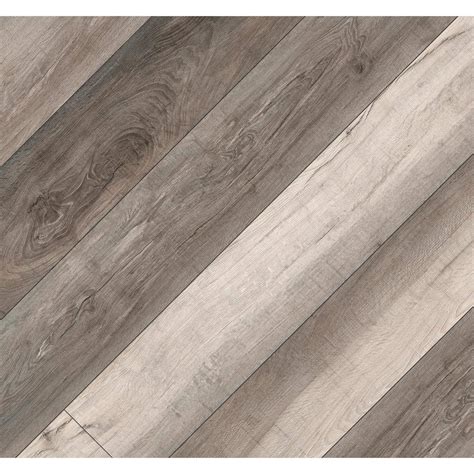 Pelican gray color finish offers the authentic look of real wood plank flooring; 5 mm thickness x 7.13 in. width x 48.03 in. length, enhanced urethane wear layer thickness is 12 mil.