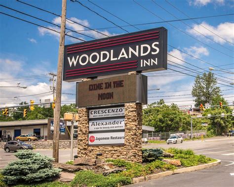 Woodlands inn. Amenities. Water, coffee, and tea available in lobby when open. Free WiFi in every cabin. (Password given at check-in.) A spacious front porch features rustic seating with ottoman and table, and a free private parking spot is … 