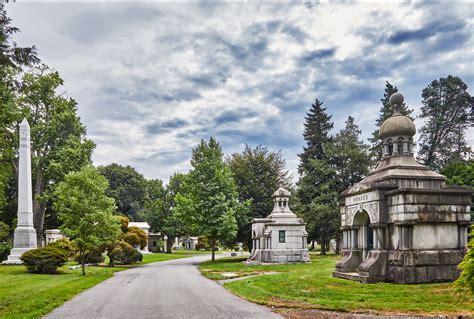 Woodlawn cemetery directory.  & E.  The tombstones were used as fill on the approaches to...