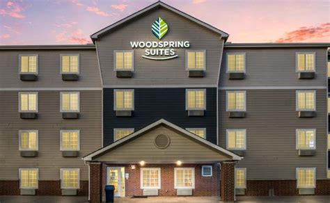  At WoodSpring Suites Denton, guests can enjoy savings with our exceptional weekly and monthly rates. Our in-room kitchens combine home-like comfort with hotel conveniences. . 