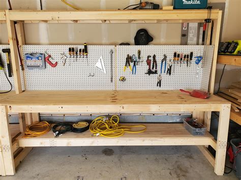 Workbench with pegboard. The Ultimate Pegboard Workbench measures 48 inches in width, 30 inches in depth, and stands at a total height of about 69 inches with a work surface height of 37 inches. This free standing workstation features a durable 32" T x 48" Wide Wall Control pegboard backboard and high quality work surface from Wisconsin Bench produced by WB ... 