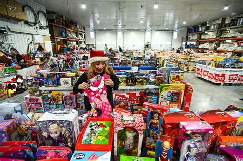 Workers sort gifts at Toys For Tots distribution center