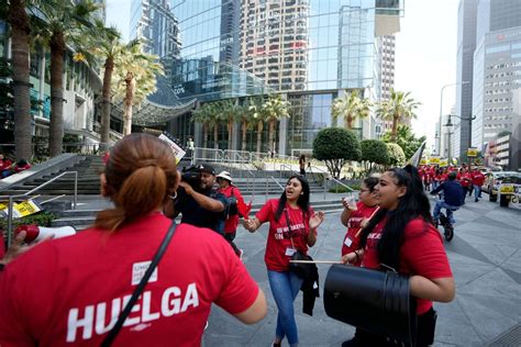 Workers strike at major Southern California hotels over pay, benefits