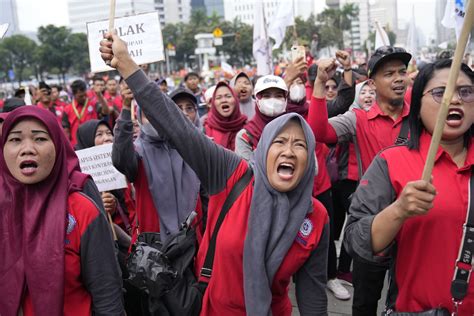 World’s workers, squeezed by inflation, rally on May Day