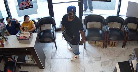 Would-be robber completely ignored in Atlanta nail salon, video shows