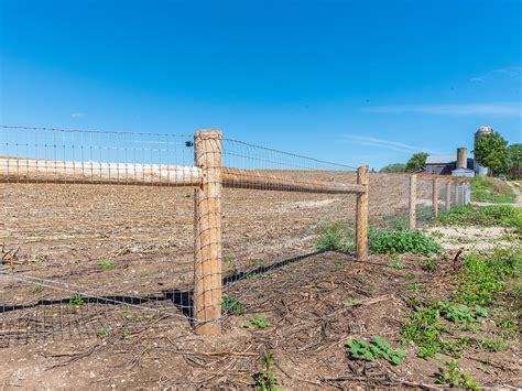 Woven wire fence. Our fence is designed with 2” x 2” spacing, making it ideal for protecting pets and property. The woven construction features our exclusive Square Deal® Knot, which means the fence won’t sag or buckle. Designed to flex on impact, the knotted mesh won’t break like welded wire, providing a safe, secure and long-lasting enclosure. 