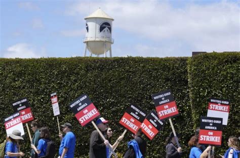 Writers Guild and Hollywood studios reach tentative agreement to end strike. No deal yet for actors