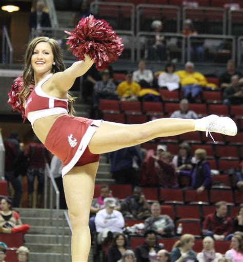 Since the departure of their former coach in June, the WSU cheer team has hired an entirely new coaching staff. Emily Peterson, a WSU alum who cheered on the team from 2017–21, took over the program as the new head coach. As home games approach, the team is working on their skills while still adjusting to the new staff.. 