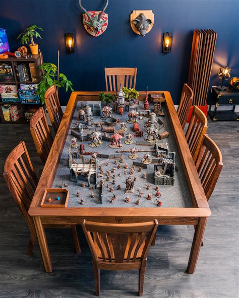Wyrmwood gaming table. Some funny ideas for table topics are “the art critic,” “the irrelevant word game” and “unusual places.” Each of these short, topic-related games helps break the ice between strang... 