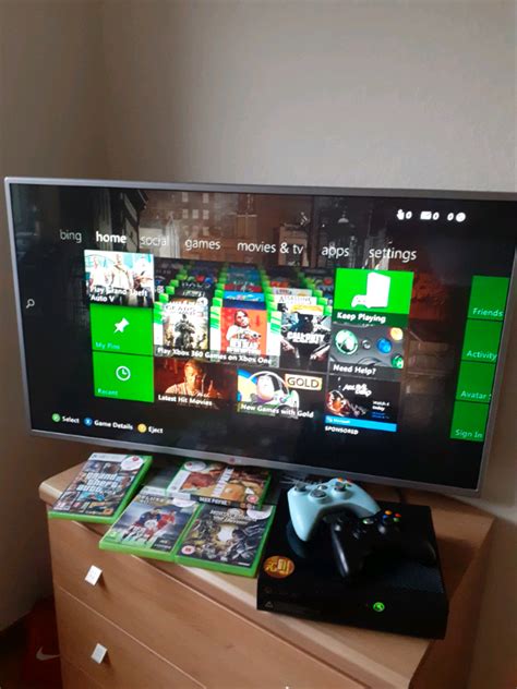 Xbox 360 built in wifi set with 2 controllers & 22 games for Sale in ...