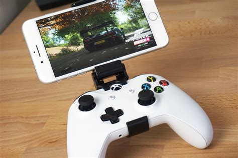 Xbox phone controller. Games that have custom-designed touch controls will automatically display them when a controller is not connected. ... For instance, tilting your phone side to ... 