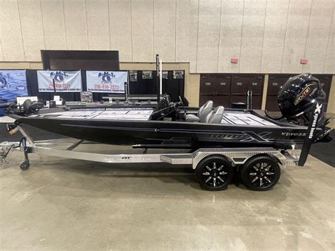 1 Butt Seat w/ Adjustable Pro Pole. 1 Fold Down Fishing Seats with 13” Extensions. Front Deck Lockable Storage Boxes. 2 Storage Boxes in Rear Deck. Trim Switch on Bow. Thru Transom Hydraulic Hose Fittings. 8 Gauge Trolling Motor Harness. Hydraulic Steering (150 HP or Less) (X19 & X21) Port Side Xclusive Rod Organizer (X19 & X21) . 