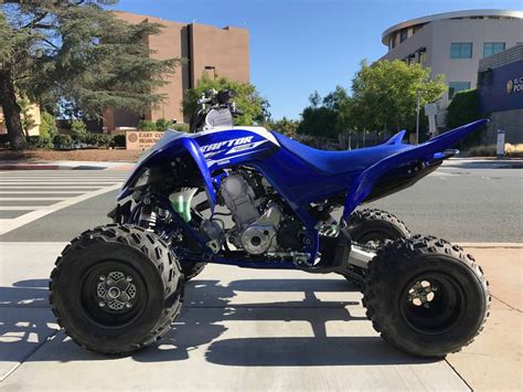 The big power of the 2016 Yamaha Raptor 700R's 686cc, fuel injected engine is matched with a lightweight hybrid steel aluminum frame, Controlled-Fill aluminum sub-frame and cast aluminum swing-arm. It rides on a double A-arm front suspension, which uses YZ-style piggyback shocks with high and low-speed compression, rebound and threaded preload ...