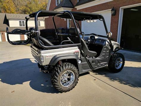 2006 Yamaha Rhino 660 4x4 Low Miles! - $6300 condition: excellent make / manufacturer: Yamaha Rhino model name / number: 660 2006 Yamaha Rhino 660 4x4. Only 468 miles!! One owner since new. Accessories include 4000 lb Warn Winch, Center Console with cup holders, Brush Guard, Rear Bumper, Dump Box Railings, Half Glass Windshield, Cloth Camo Top ... .