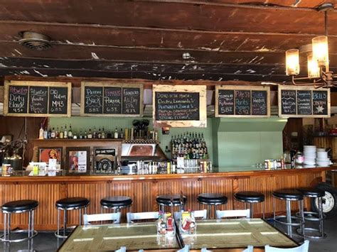 Yankee Bill’s Saloon - just a few miles east down M179 from the lake in the country Yankee Bill’s features wood fired pizza, house smoked meats and bbq, craft beers. Outdoor patio. Ask the owner the story of Yankee Bill. https://yankee-bills-wood-fired-saloon.business.site . 