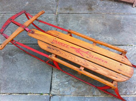Yankee clipper sled. A little research tells me this is from the 1960s. A Yankee Clipper No. 12 Wood and metal Sled. Front handlebar still moves to steer. Says Yankee Clipper No. 12 (see photo) and also says S.L. Allen & Co Phila PA Manufactures of the Flexible Flyer Sled and Planet Jr. Farm & Garden Tools (see photo). Appears to still be in good condition ... 