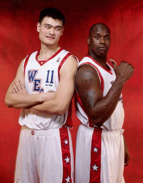 yao ming standing next to shaq. types of