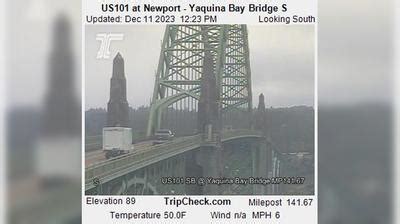 Yaquina bay bridge cam. May 18, 2016 · Having spent ten days based in Newport, we frequently traveled over the Yaquina Bay Bridge, whose completion in 1936 meant the construction of U.S. Highway 101 was over. It spans Yaquina Bay south of Newport. Approximately 220 men were employed to construct the bridge. It’s a combination of steel and concrete arches. 