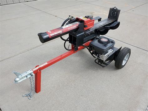 The Yard Machine log splitter is easy to use. Just put the log in there, and it has enough power to slowly crunch the wood apart. It even works fine on the really big pieces of wood and ones that have knots and so on..