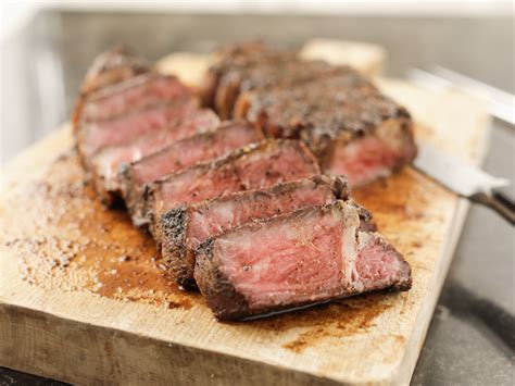 York strip steak. Both porterhouse and New York strip steaks are high in protein, iron, zinc, and vitamin B12, which are essential for overall health and muscle growth. Porterhouse steaks have a T-shaped bone, which adds fat and calories but also provides a richer flavor. New York strip steaks have a uniform fat distribution, making them leaner. 