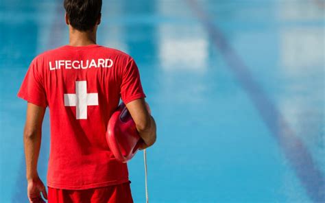 You and another lifeguard find an unresponsive adu