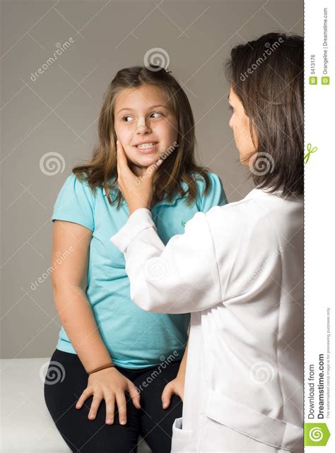 Young doctor checks girl