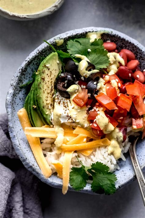 Yumm bowl. Deluxe Toppings on all Yumm! Bowls®: Sliced Avocado, Diced Tomato, Cilantro, Black Olives, Cheddar Cheese, Sour Cream. Original. Organic Brown Rice, Yumm! Sauce®, Organic Black Beans, Fresh Mild Red Salsa, Deluxe Toppings. Small $9.00. Medium $10.50. Large $12.00. 