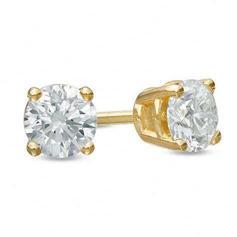 Zales diamond earrings gold. Find a new reason to celebrate with the timeless and elegant sparkle of these princess-cut lab-created diamond solitaire stud earrings. Fashioned in 14K white gold Each earring showcases a sparkling 1/4 ct. certified princess-cut lab-created diamond solitaire, boasting a color rank of F and clarity of SI2. 