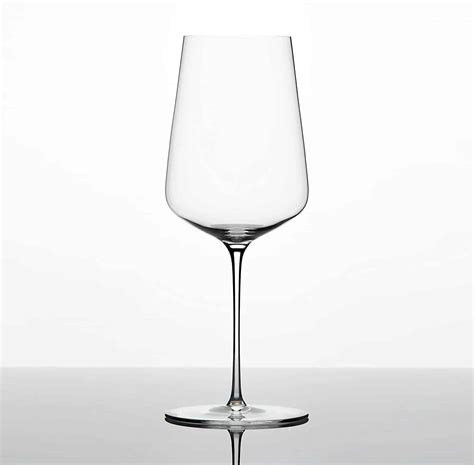 Zalto universal wine glass. i've tried the same wine from - ikea glasses ($2/ea) - spiegelau ($10-$15/ea) - zalto ($60/ea) i don't like it anymore than you do but it makes a big difference: taste, aroma, experience, all better in a zalto glass. if i were bringing my own glass to a tasting of fine wines i'd bring the zalto 10/10 