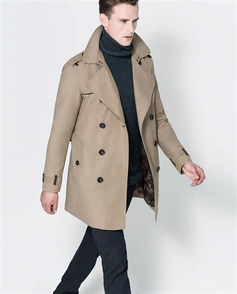 Zara men trench coat. TRENCH COAT. 55.90 USD. Lapel collar coat with long sleeves. Front double breasted button closure with belt. Epaulette detail and belted cuffs. ... ZARA / TRENCH COAT ... 