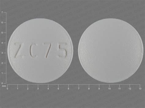 Pill Imprint C 75. This blue elliptical / oval pill 