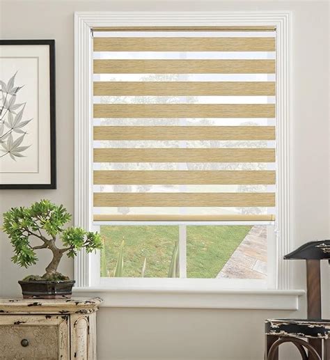 Zebra blinds amazon. Jul 6, 2023 · Zebra blinds and zebra shades are essentially the same product. Unlike traditional roller shades, they feature a unique design with alternating horizontal stripes of sheer and solid fabric. When adjusting using a cord or motor, the fabric rolls through the bottom bar, causing the stripes to overlap and control the amount of light entering the room. 