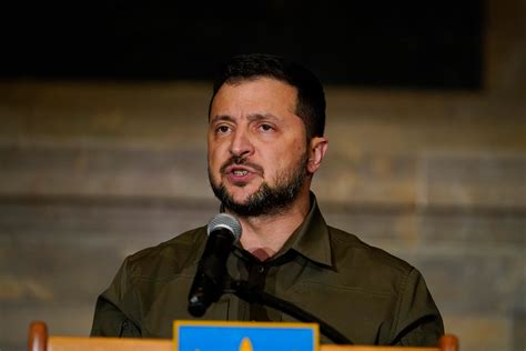 Ukraine likely won’t join NATO anytime soon, but it’s a big symbolic move in a war that’s increasingly going against the Kremlin. Ukrainian President Volodymyr Zelensky talks during a press ...