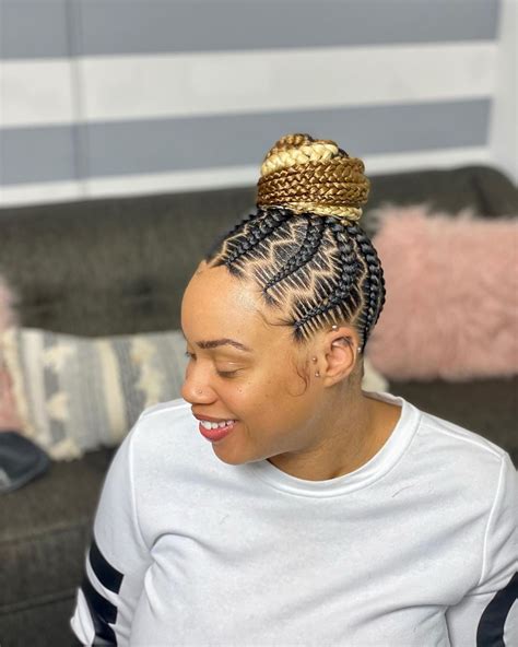Zig zag braided ponytail. A braided ponytail with curls is a style that’s destined to look amazing. Hair is divided into zig-zag sections with knotless cornrows braided up into a high ponytail with the remaining braids sitting cute over the shoulders. 47. Long Brown and Blonde Knotless Goddess Box Braids with Heart-Shaped Cornrows 
